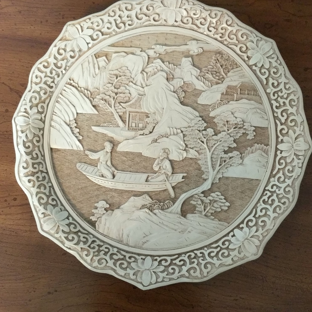 Ivory look decorative plate, looks carved